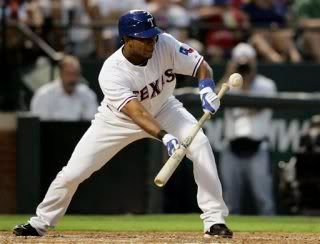 Elvis Andrus executes a perfect suicide squeeze Wednesday night, helping Texas to the 3-game sweep of the Red Sox.