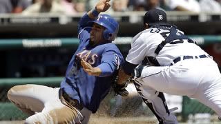 Nelson Cruz gets thrown out at the plate Thursday afternoon.
