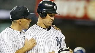Manager Joe Girardi chats with Mark Teixeira after he was hit by a pitch in the fourth.